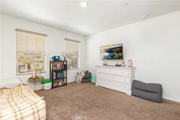 a room with furniture and a window