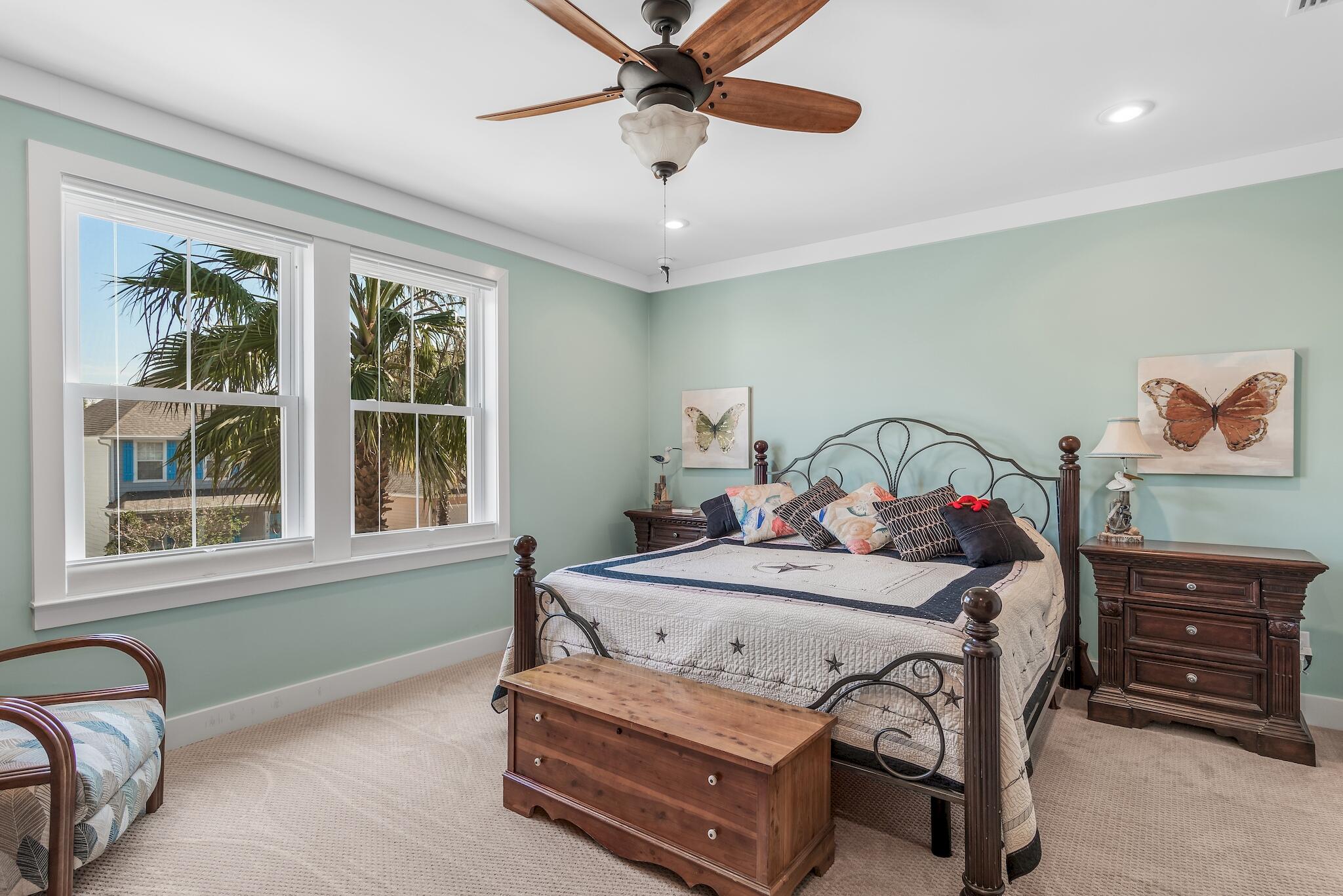 225 Turtle Cove Panama City Beach, FL 32413 - Photo 18 of 43 a bedroom with a bed a window and dresser