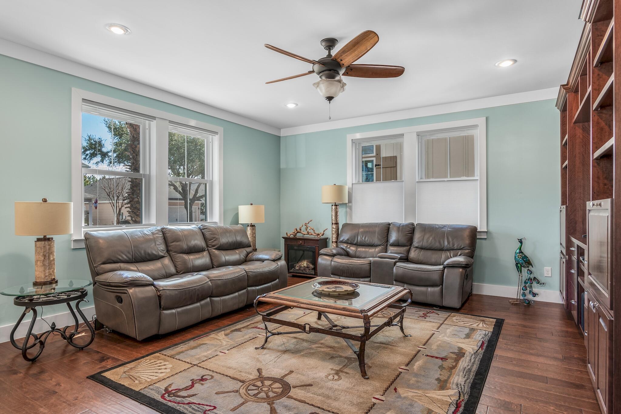 225 Turtle Cove Panama City Beach, FL 32413 - Photo 3 of 43 a living room with furniture and a window