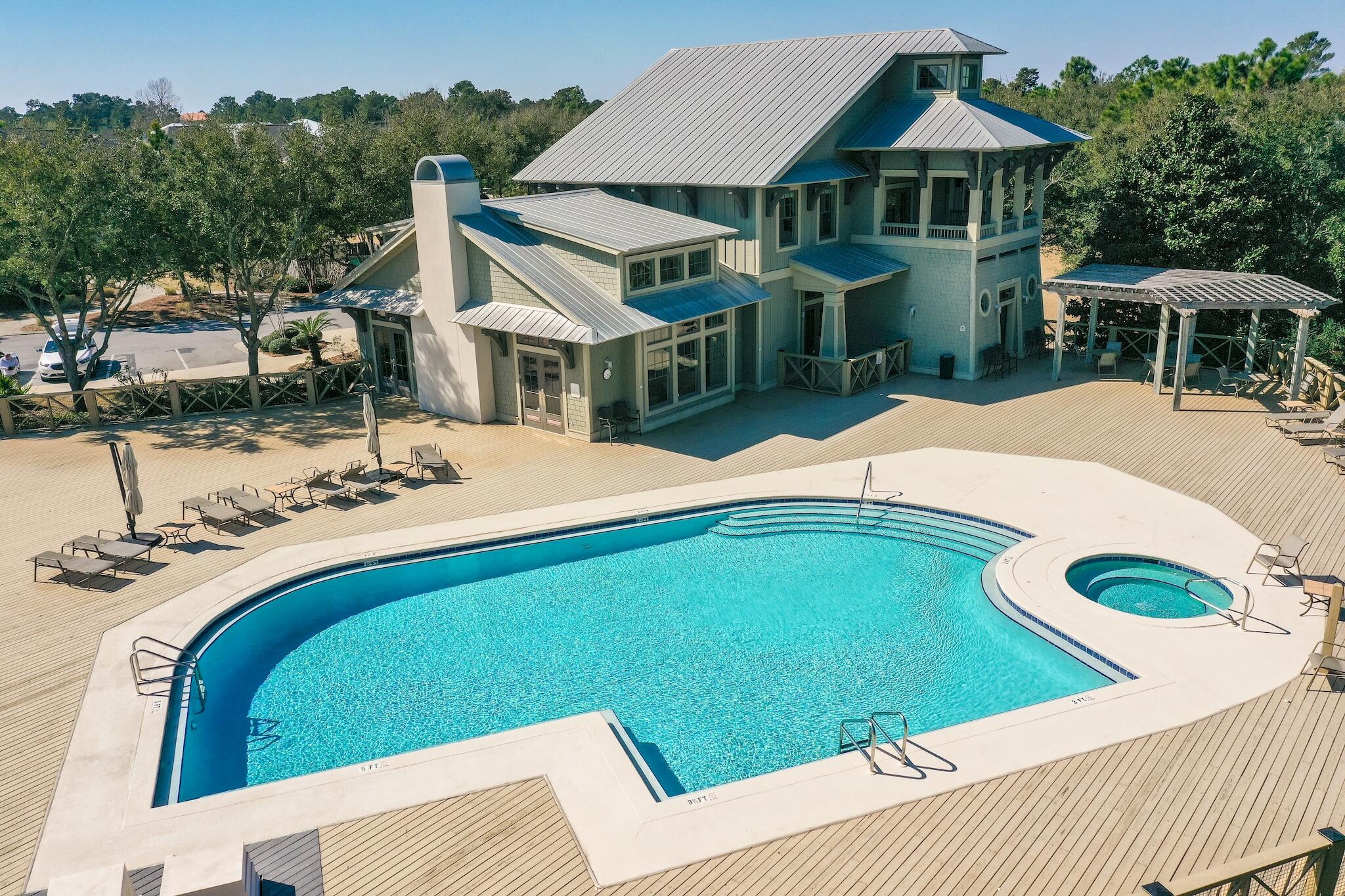225 Turtle Cove Panama City Beach, FL 32413 - Photo 35 of 43 a balcony with table and chairs