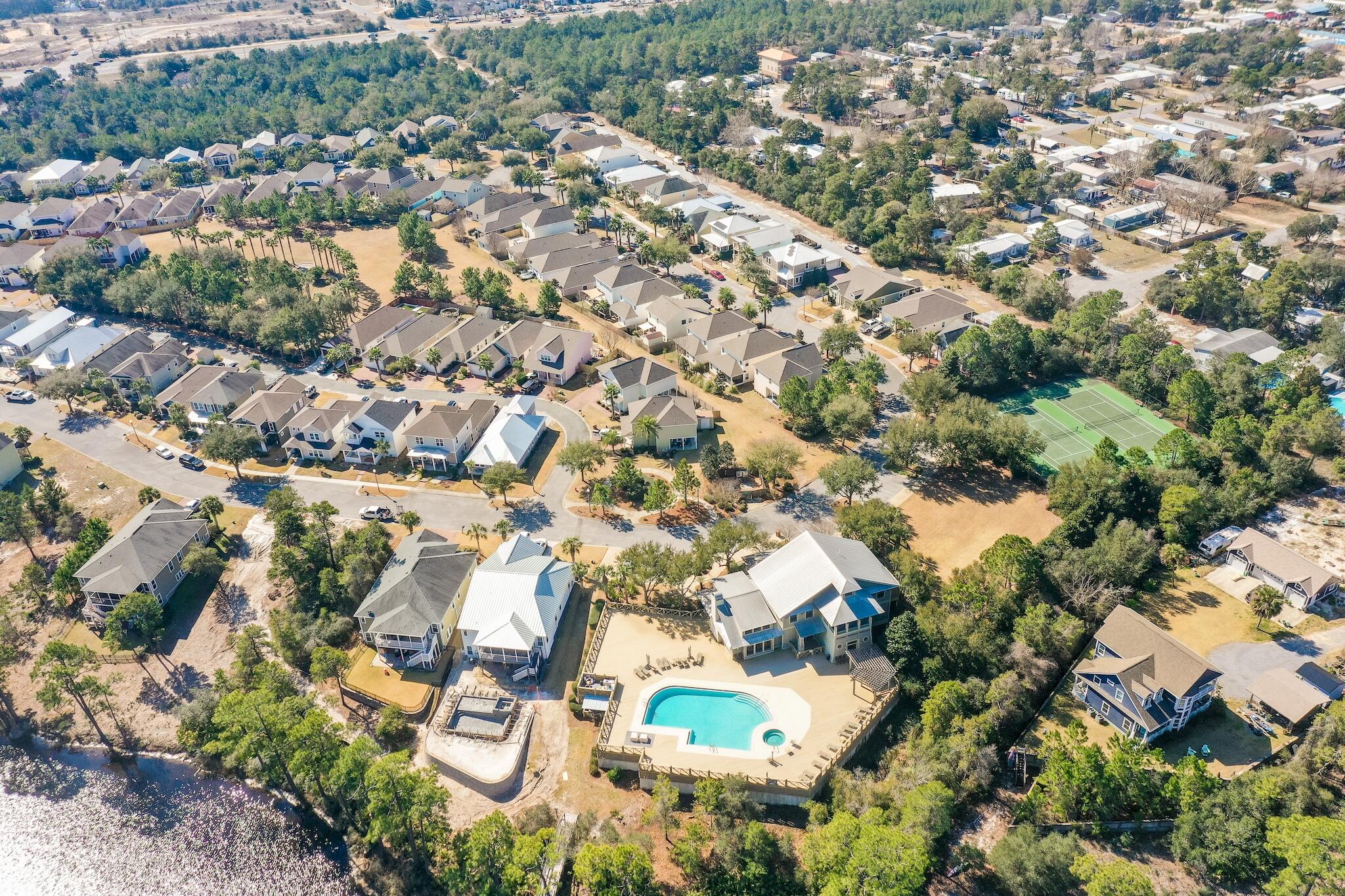 225 Turtle Cove Panama City Beach, FL 32413 - Photo 36 of 43 an aerial view of residential building with green space
