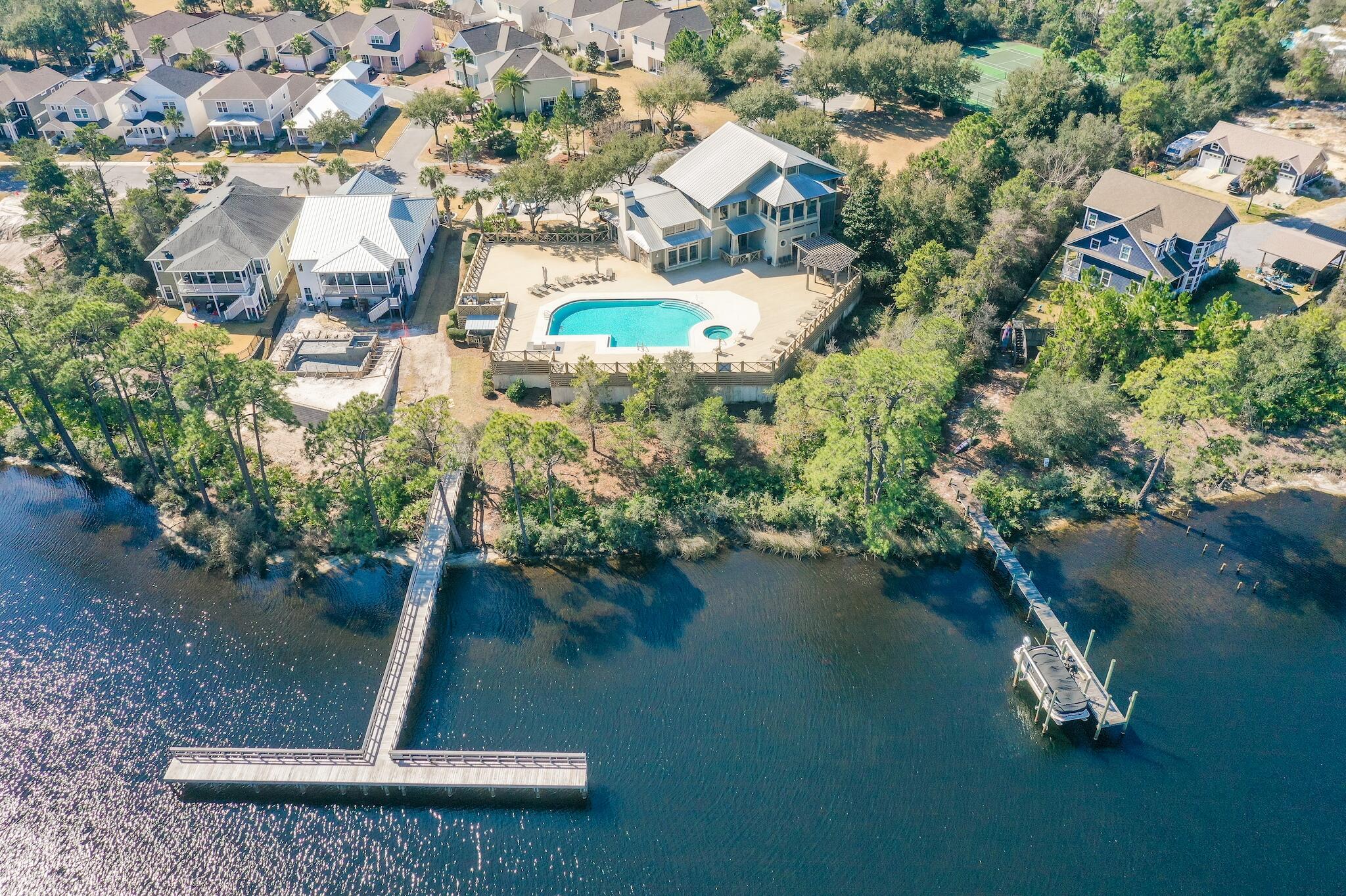 225 Turtle Cove Panama City Beach, FL 32413 - Photo 40 of 43 an aerial view of a residential houses with outdoor space and street view
