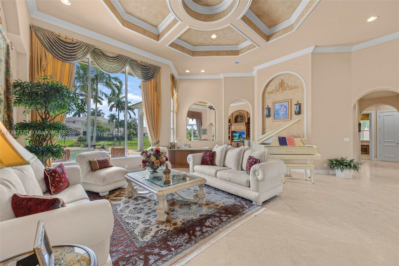 3250 West Stonebrook Circle Davie, FL 33330 - Photo 15 of 73 a living room with patio furniture and a large window