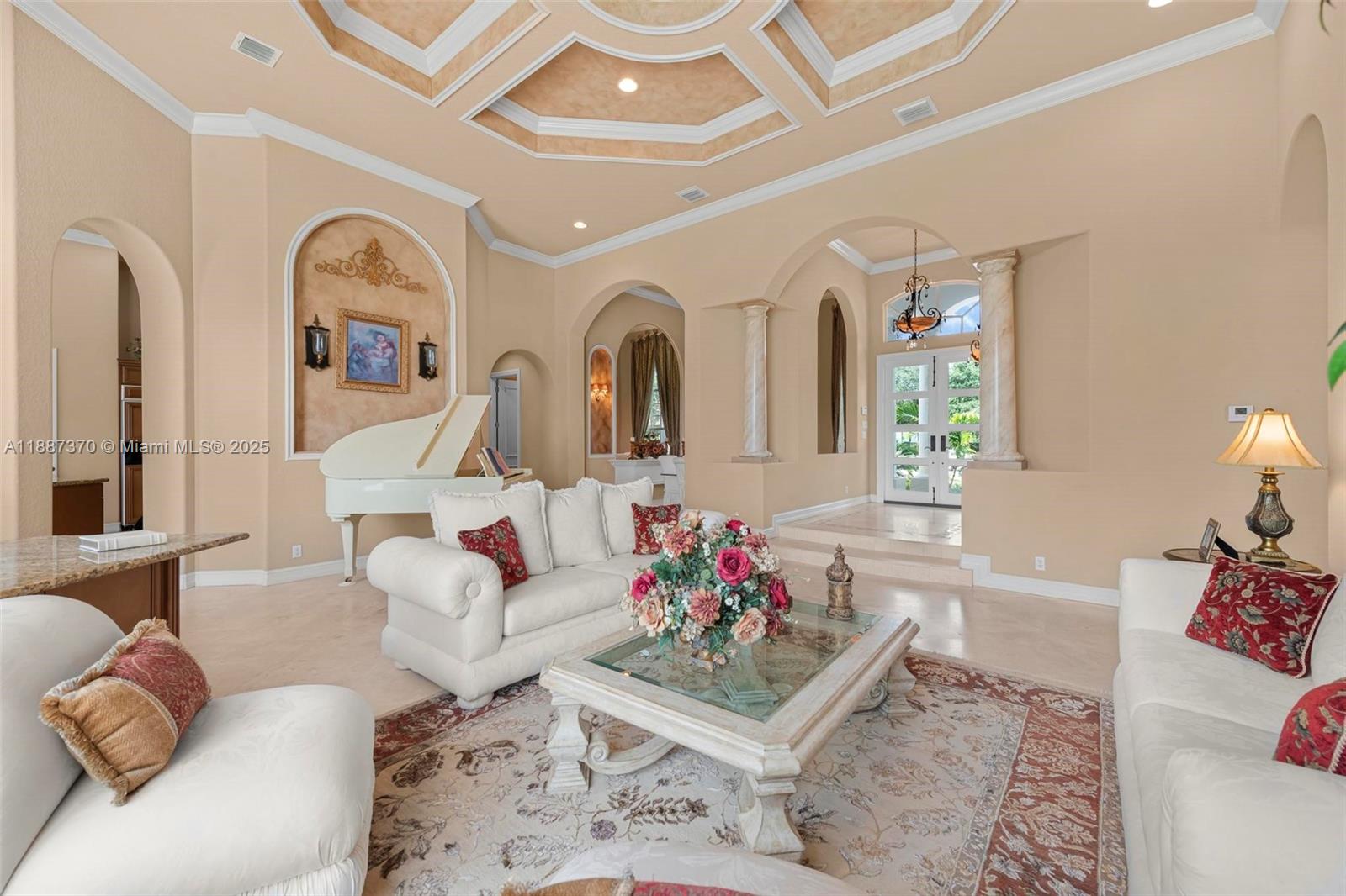 3250 West Stonebrook Circle Davie, FL 33330 - Photo 17 of 73 a living room with furniture chandelier and a rug