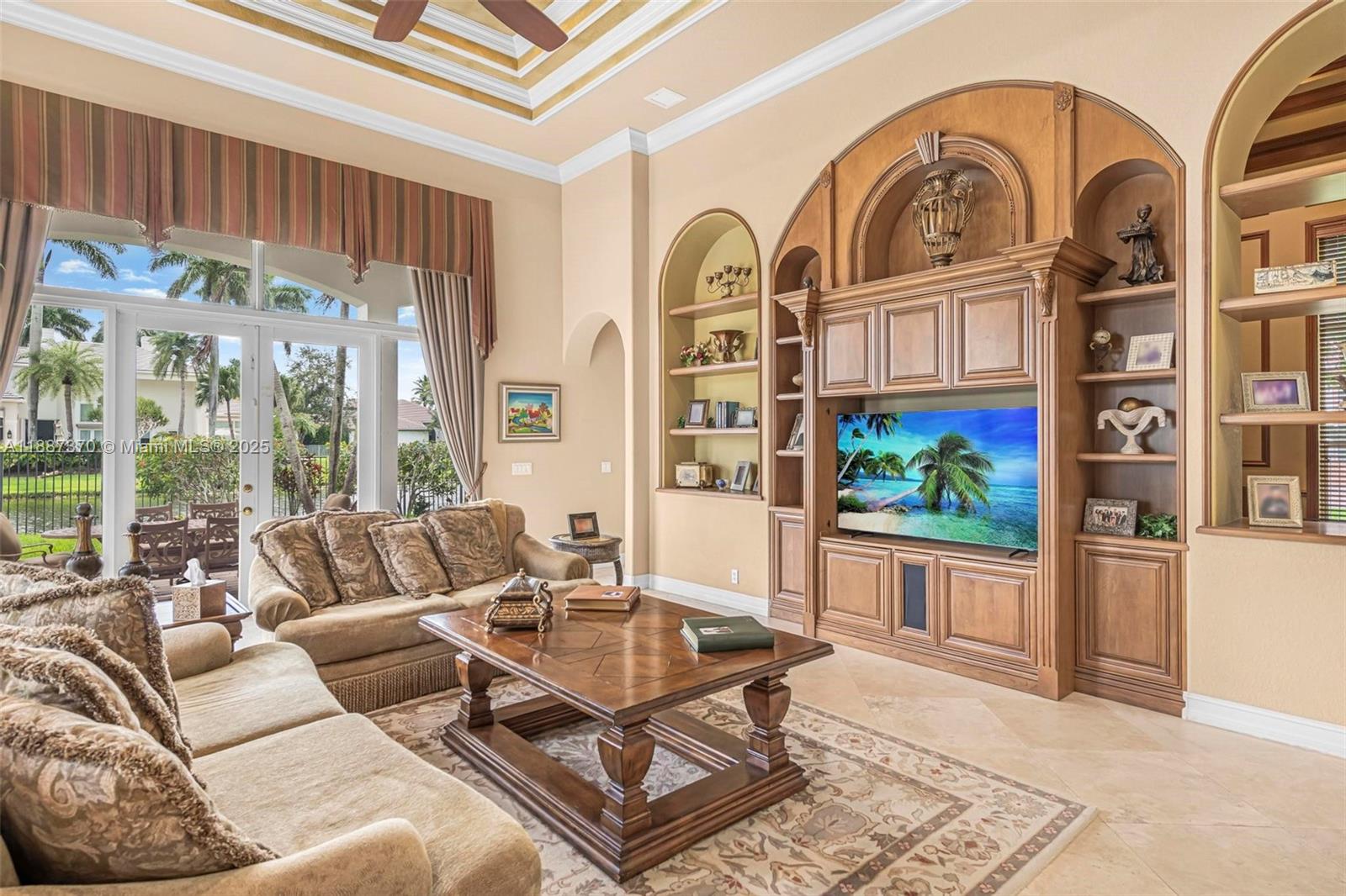 3250 West Stonebrook Circle Davie, FL 33330 - Photo 30 of 73 a living room with furniture a rug and a window