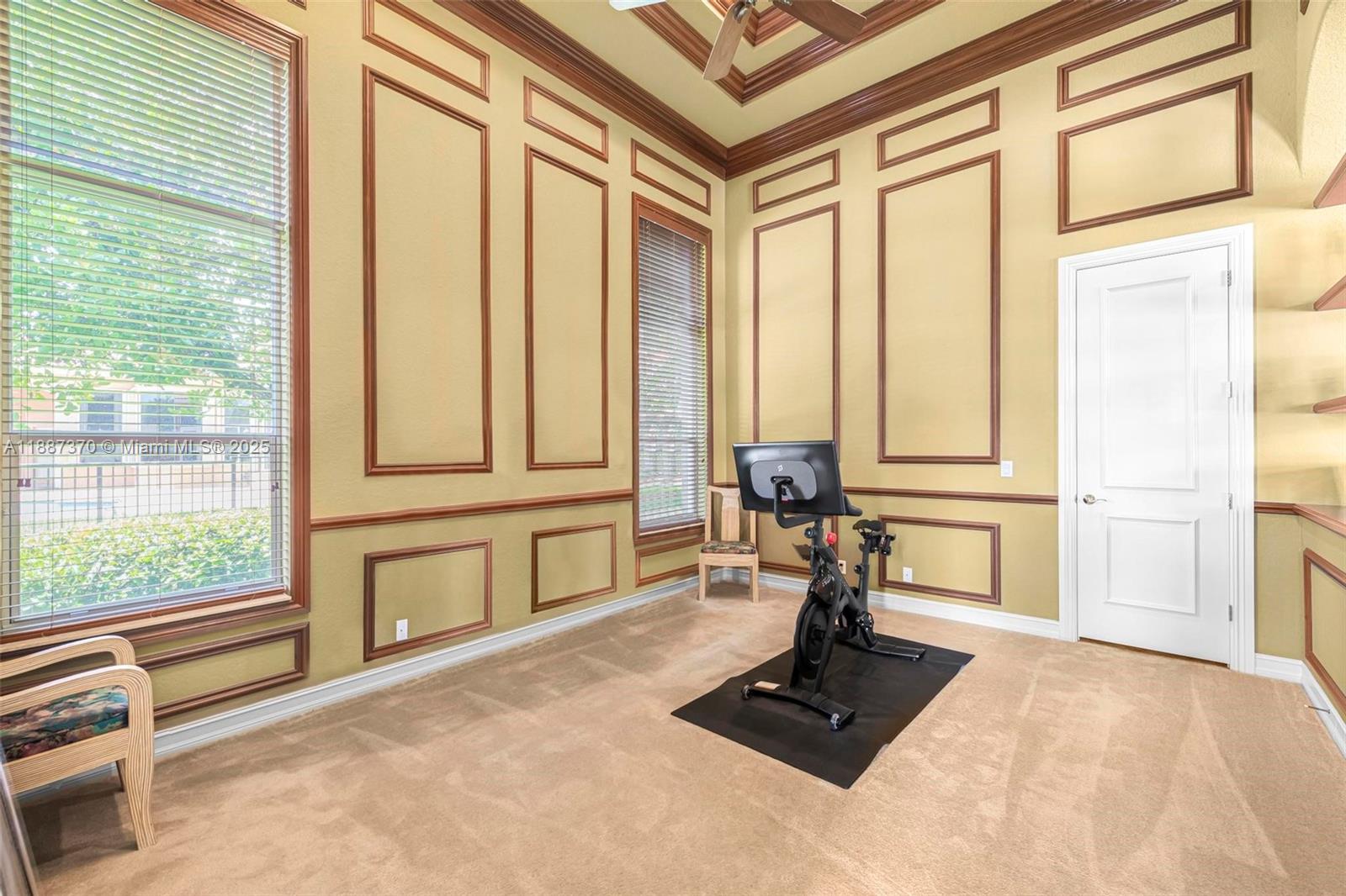 3250 West Stonebrook Circle Davie, FL 33330 - Photo 33 of 73 a view of a room with a large window and a potted plant