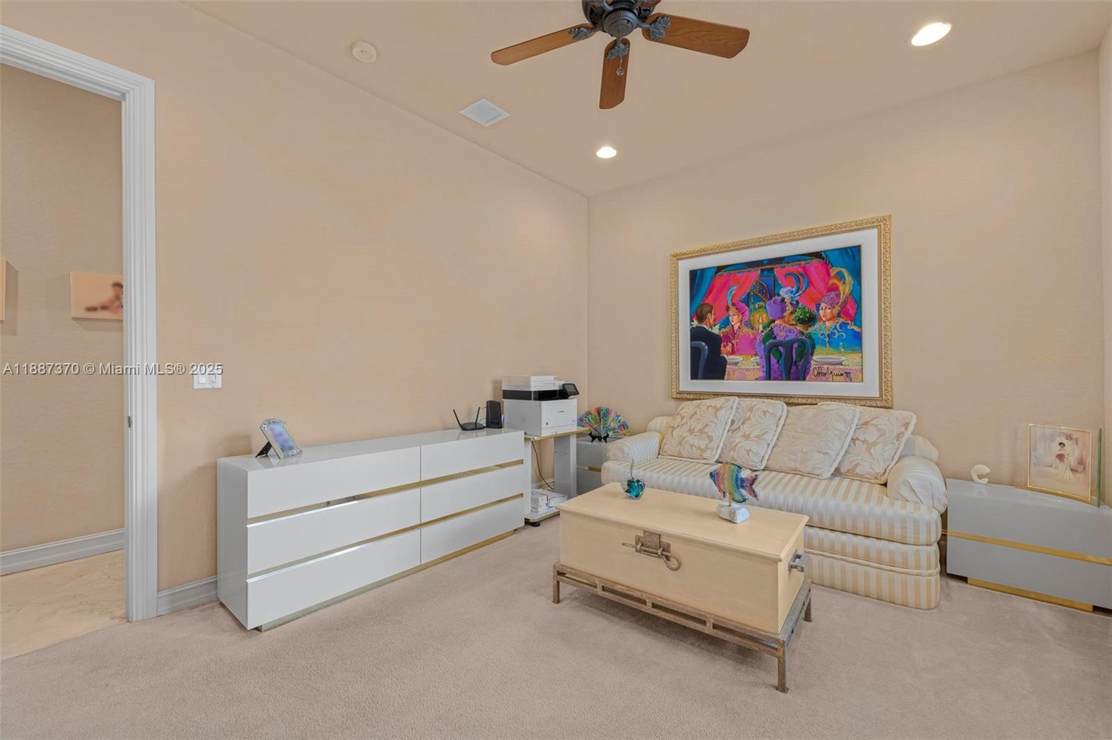 3250 West Stonebrook Circle Davie, FL 33330 - Photo 48 of 73 a spacious bedroom with a bed and a ceiling fan