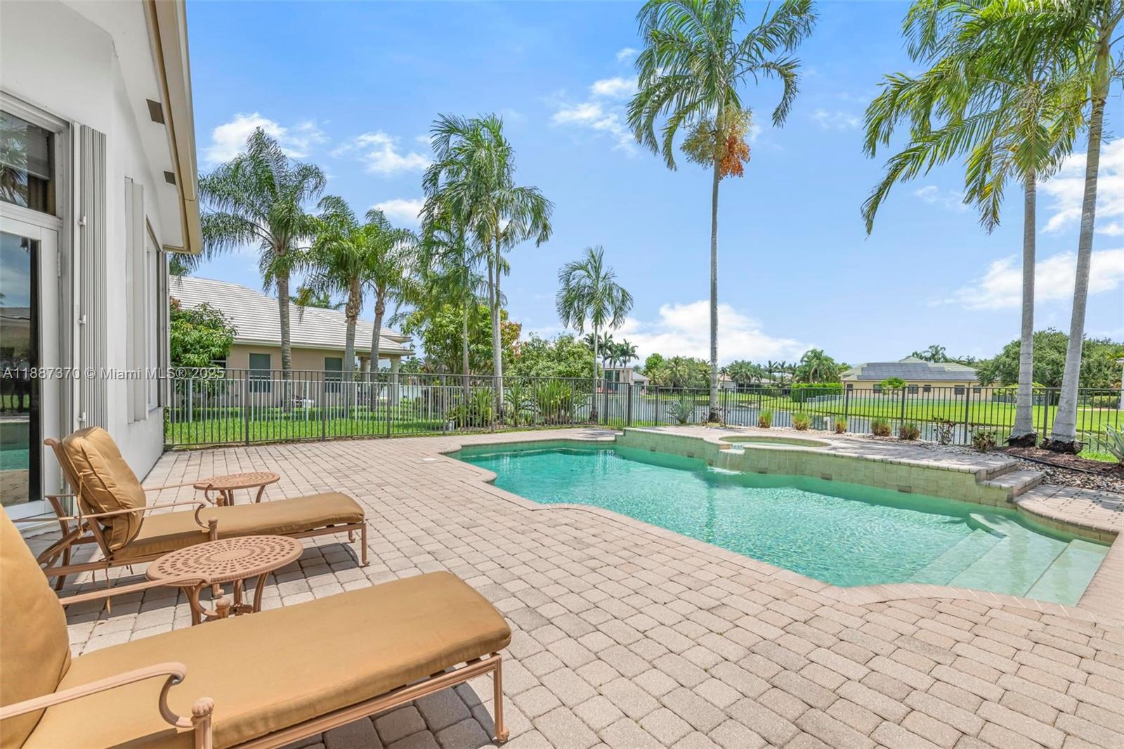 3250 West Stonebrook Circle Davie, FL 33330 - Photo 53 of 73 a view of a patio with swimming pool
