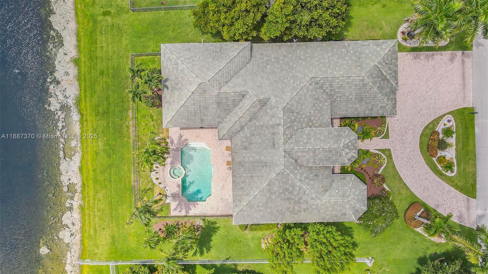 3250 West Stonebrook Circle Davie, FL 33330 - Photo 63 of 73 an aerial view of residential house with outdoor space and swimming pool