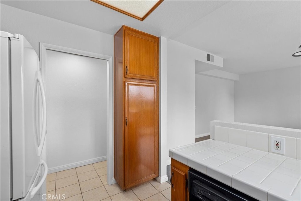 4512 Workman Mill Road, Unit G128 Whittier, CA 90601 - Photo 11 of 26 a view of kitchen island