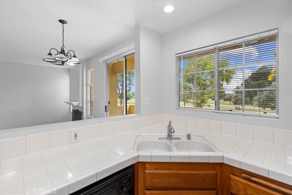 4512 Workman Mill Road, Unit G128 Whittier, CA 90601 - Photo 12 of 26 a bathroom with a sink and a window