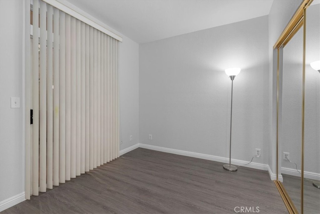 4512 Workman Mill Road, Unit G128 Whittier, CA 90601 - Photo 18 of 26 a view of a room with wooden floor