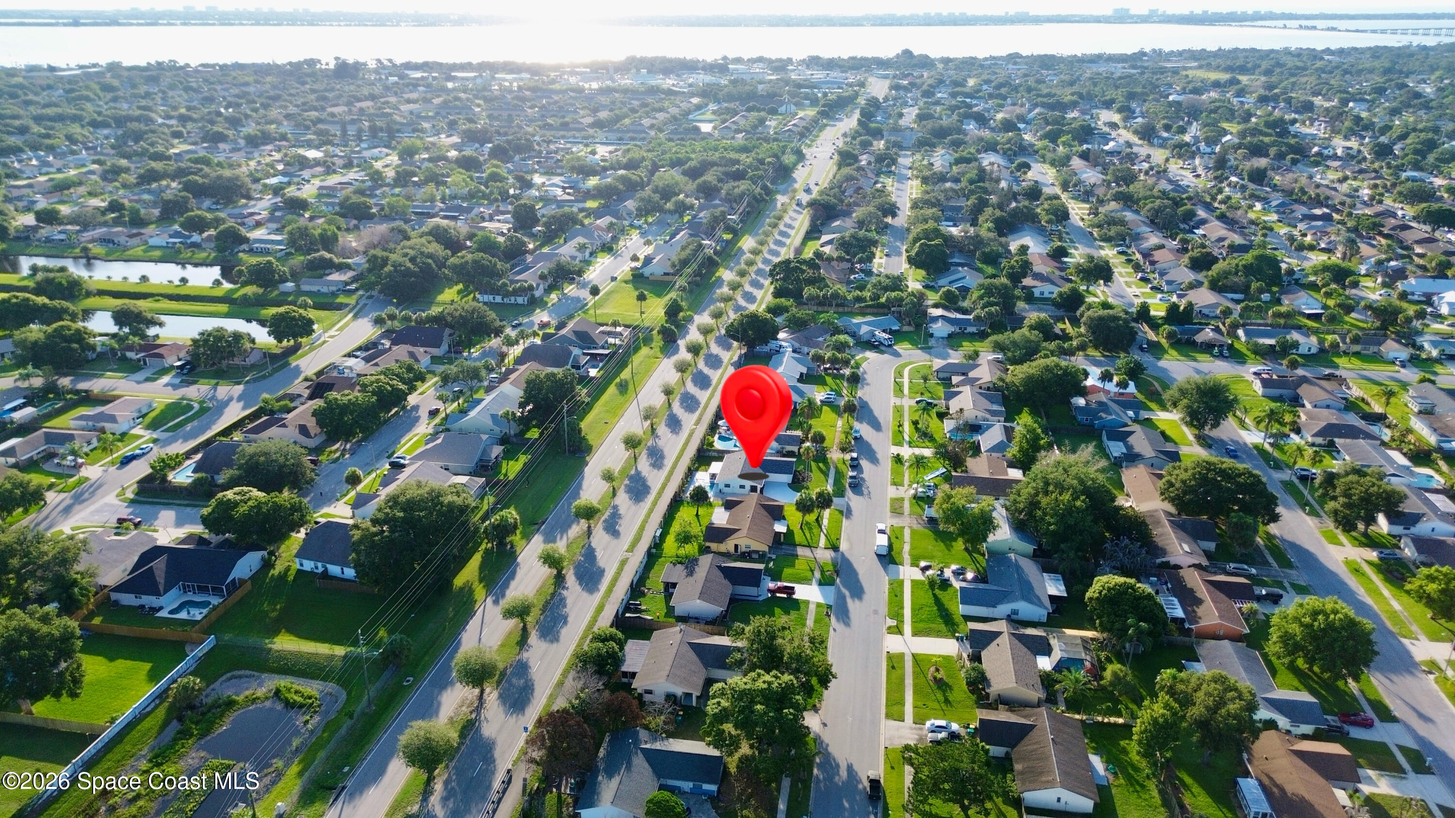 1910 Tallridge Road Melbourne, FL 32935 - Photo 33 of 34 drone 2 2