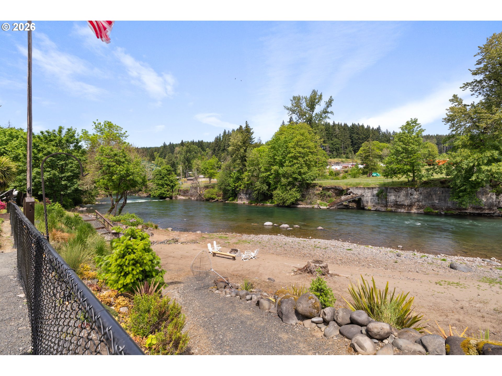 210 Southeast Whitten Road Mill City, OR 97360 - Photo 5 of 48 a view of a lake with a house in the background
