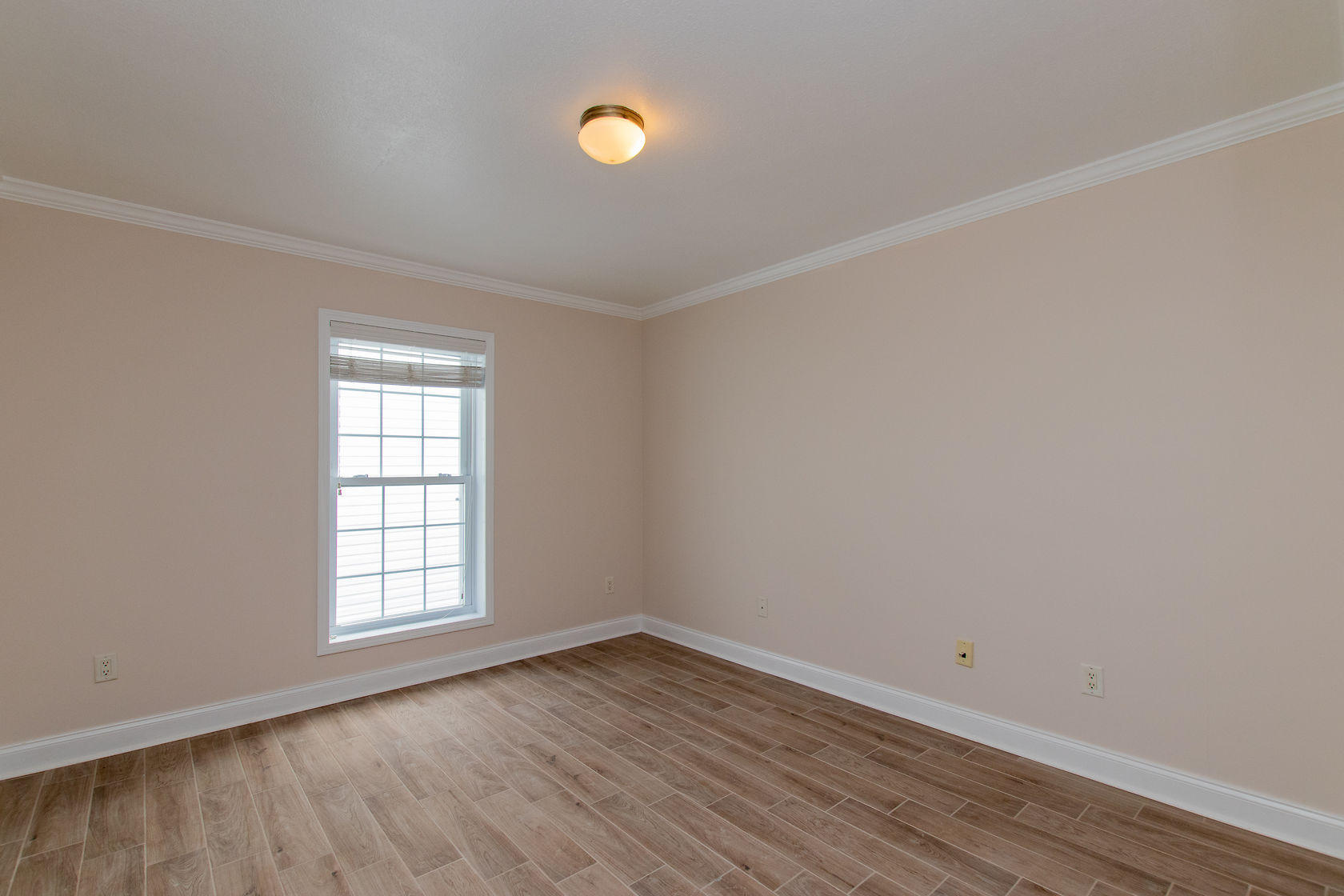 310 24th Marathon, FL 33050 - Photo 14 of 30 an empty room with wooden floor and windows