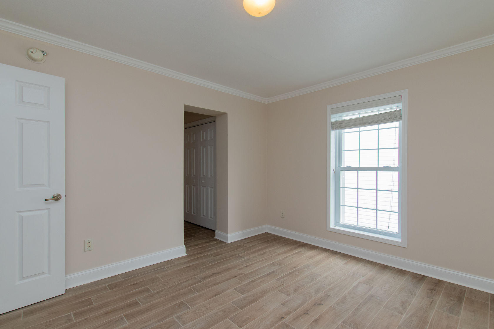 310 24th Marathon, FL 33050 - Photo 15 of 30 an empty room with wooden floor and windows