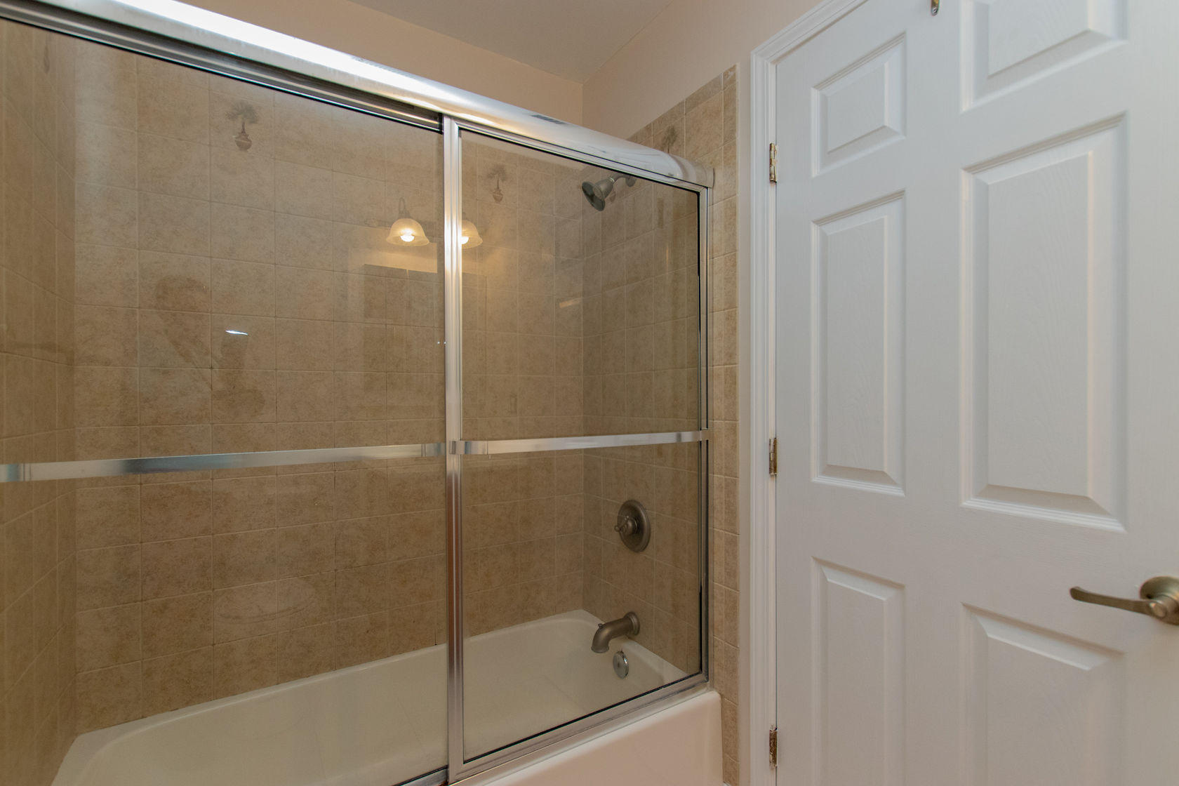 310 24th Marathon, FL 33050 - Photo 19 of 30 a bathroom with a glass shower door