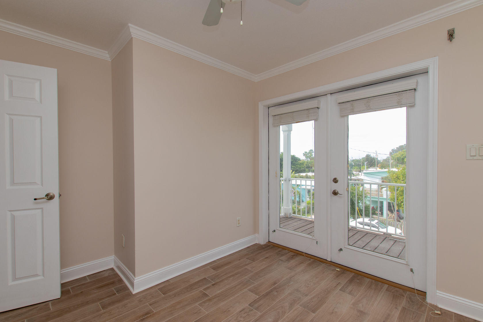 310 24th Marathon, FL 33050 - Photo 21 of 30 a view of an empty room with wooden floor and a window