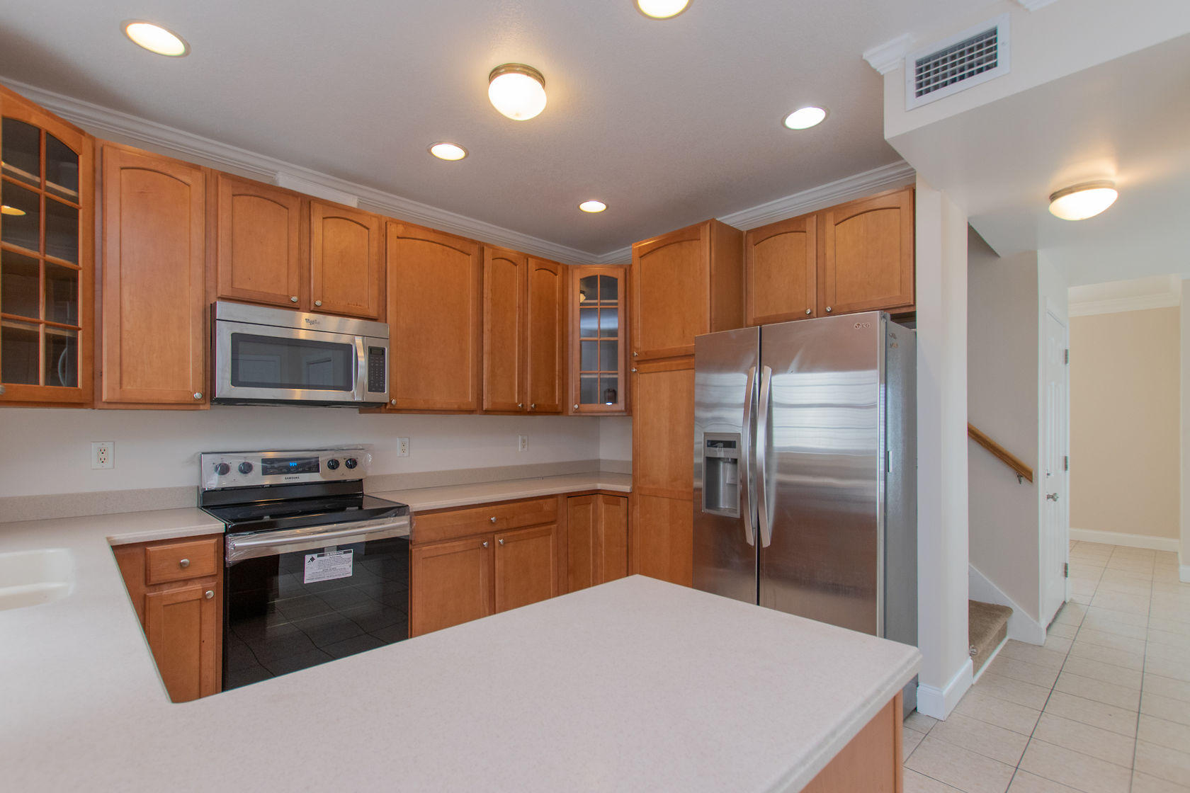 310 24th Marathon, FL 33050 - Photo 6 of 30 a kitchen with stainless steel appliances granite countertop a refrigerator oven a sink dishwasher and a refrigerator