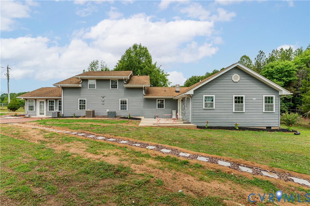 1474 Welsh Tract Road Charlotte Court House, VA 23923 - Photo 37 of 48 Rear exterior of a residence featuring gray siding