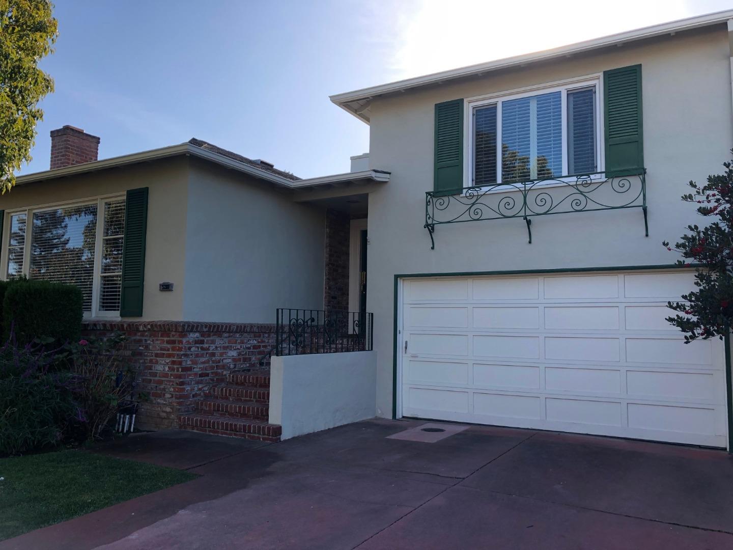 538 Maple Street San Mateo, CA 94402 - Photo 2 of 11 a front view of a house with garage