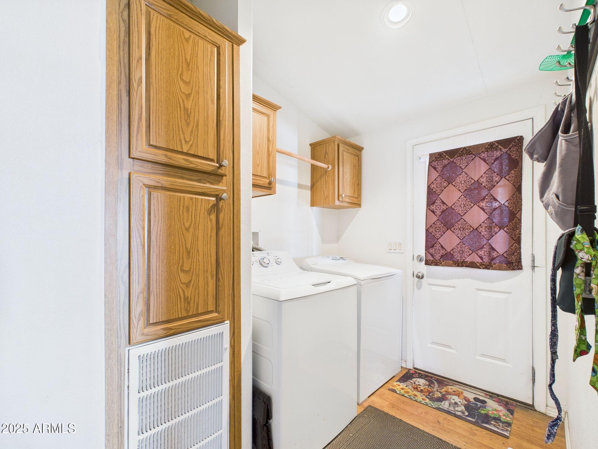 3104 East Broadway Road, Unit 230 Mesa, AZ 85204 - Photo 11 of 24 a utility room with a window and washer
