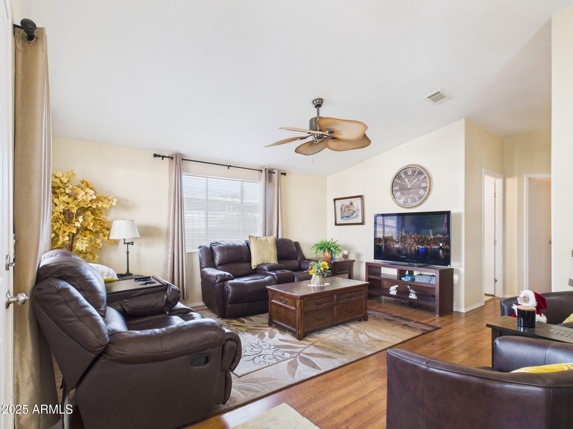 3104 East Broadway Road, Unit 230 Mesa, AZ 85204 - Photo 5 of 24 a living room with furniture kitchen view and a large window