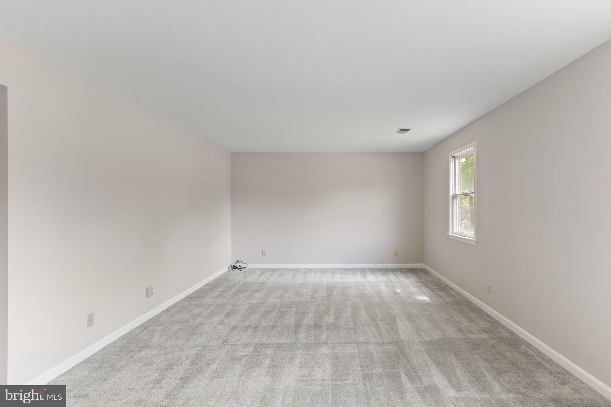 127 Oaklawn Road Stafford, VA 22554 - Photo 20 of 54 a view of an empty room with a window