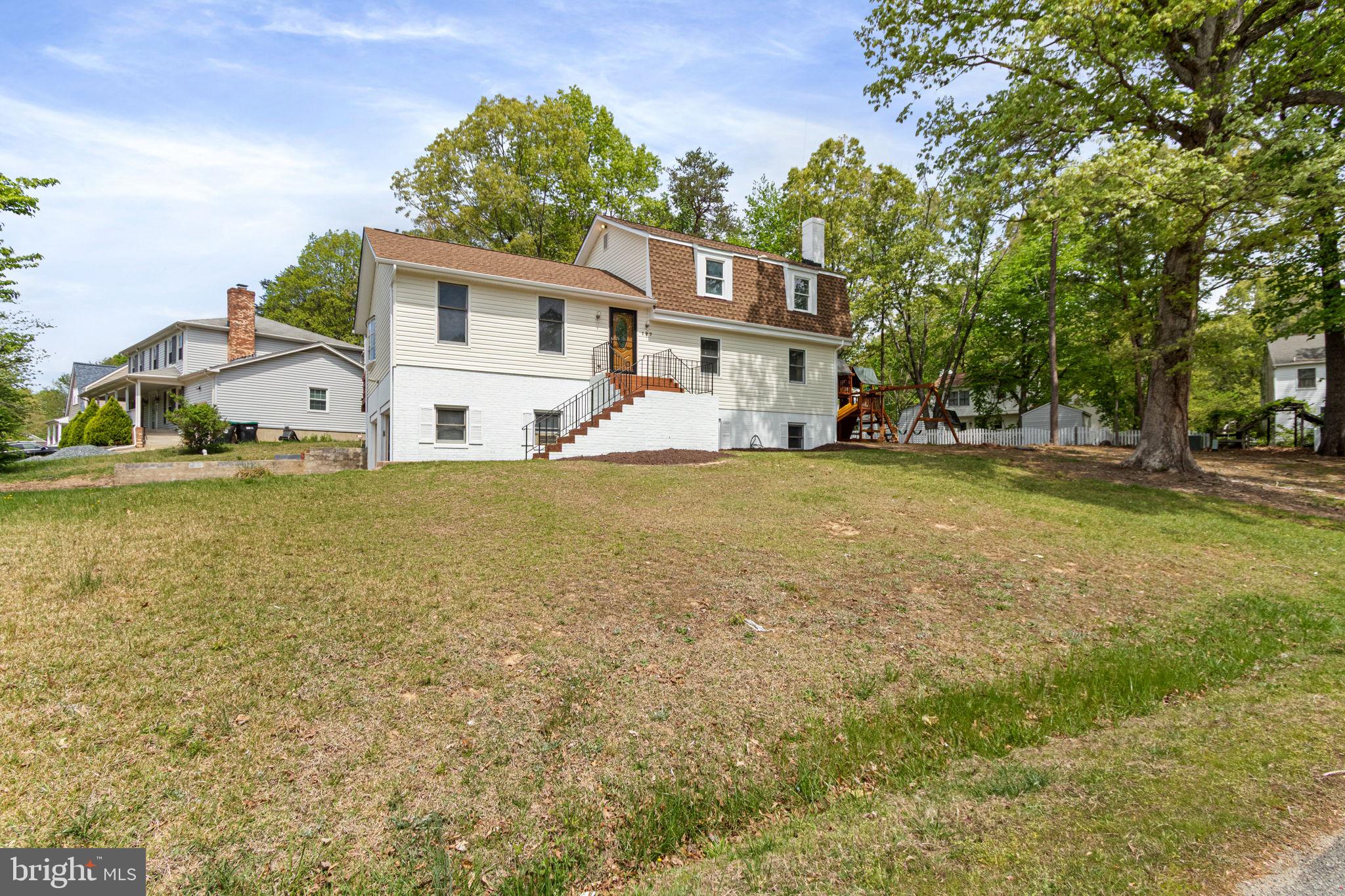 127 Oaklawn Road Stafford, VA 22554 - Photo 2 of 54 a view of a house with a yard and sitting area