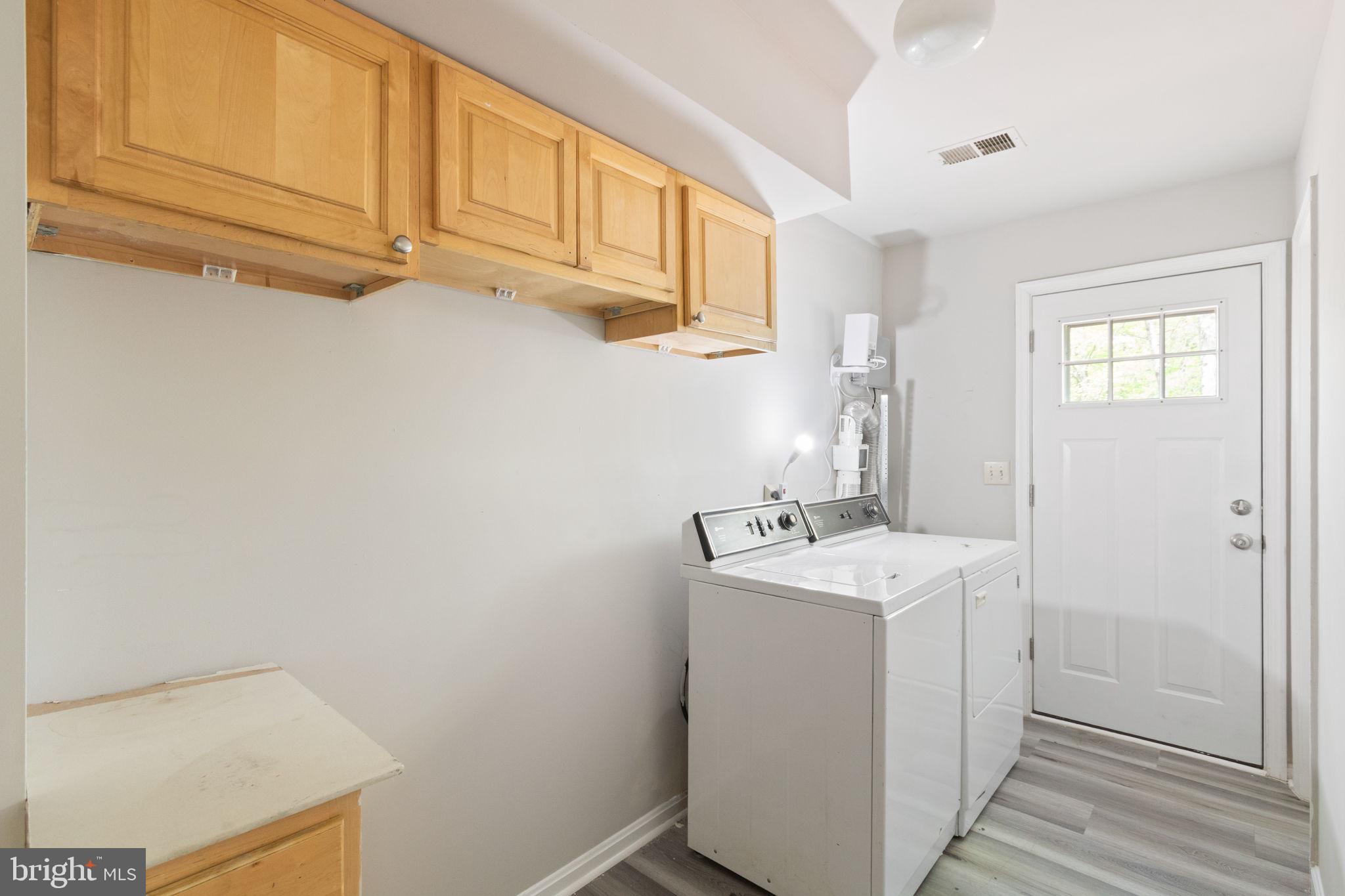 127 Oaklawn Road Stafford, VA 22554 - Photo 25 of 54 a utility room with a sink washer and dryer