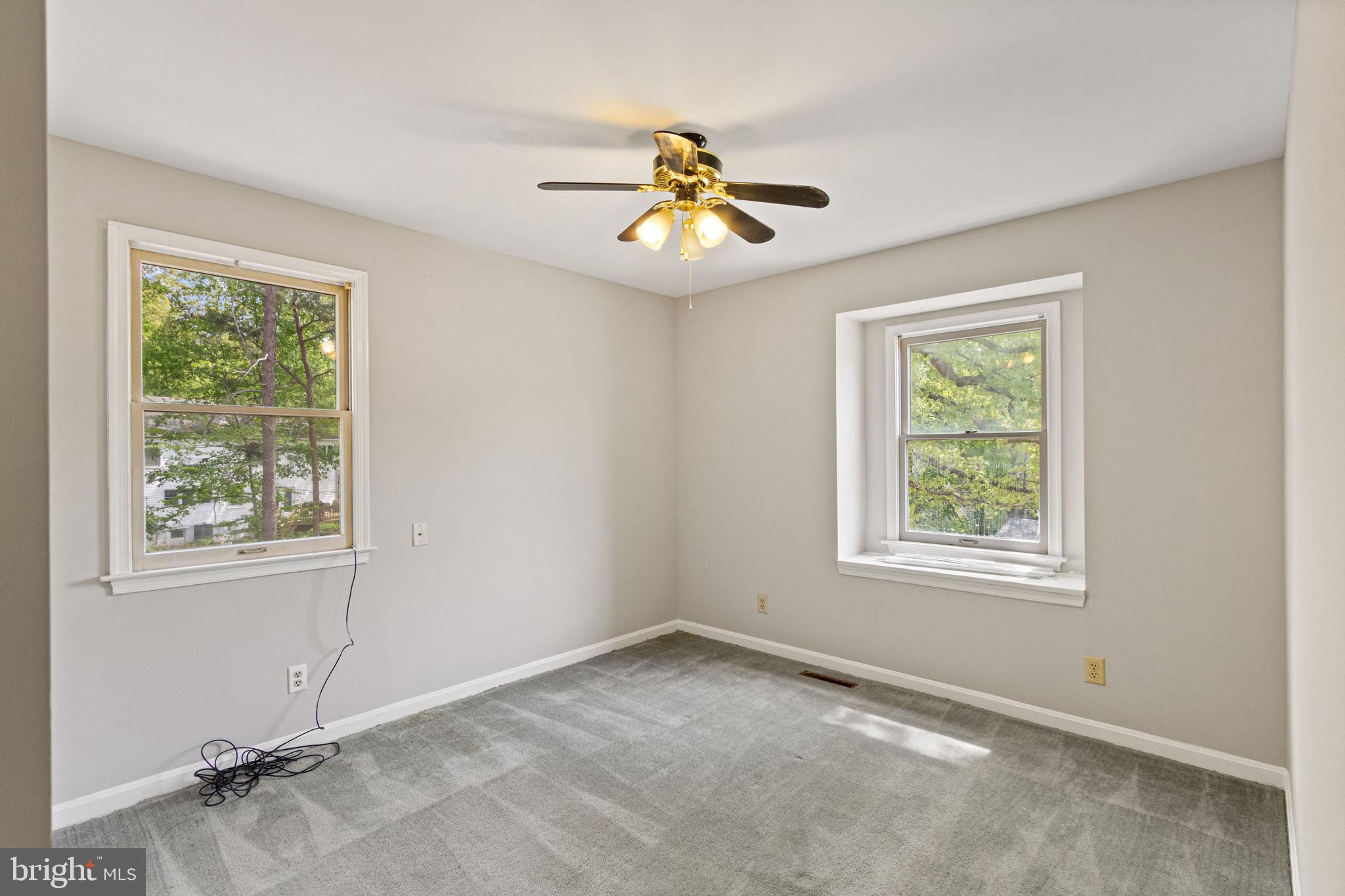 127 Oaklawn Road Stafford, VA 22554 - Photo 29 of 54 an empty room with a window and a ceiling fan