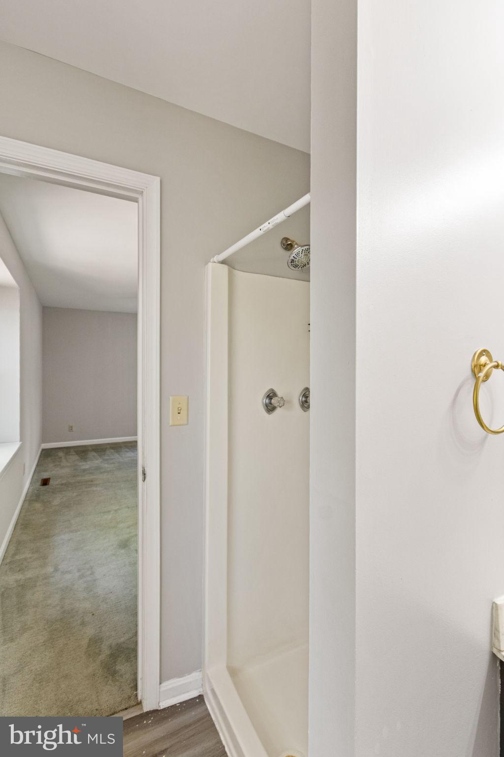 127 Oaklawn Road Stafford, VA 22554 - Photo 35 of 54 a view of a bathroom from a hallway