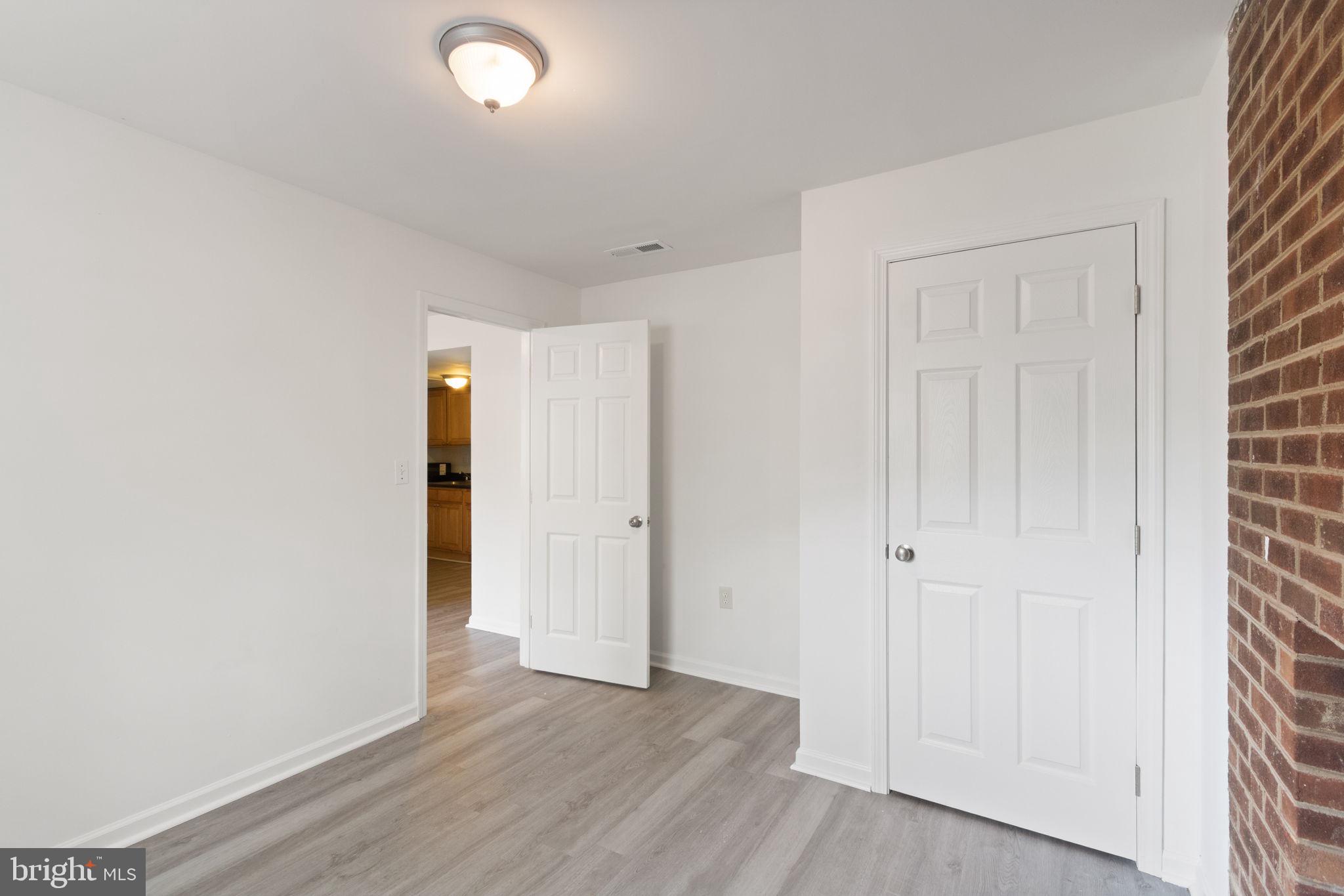 127 Oaklawn Road Stafford, VA 22554 - Photo 42 of 54 a view of an empty room with wooden floor