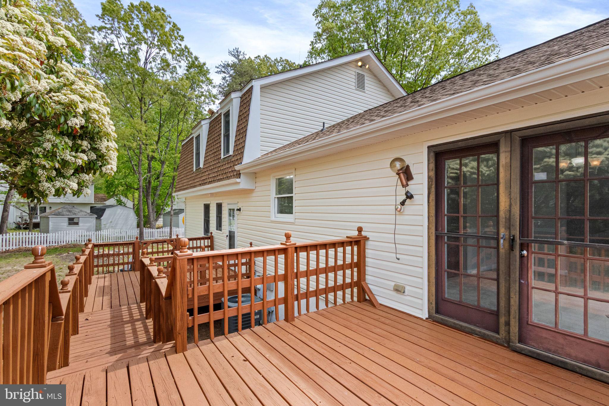 127 Oaklawn Road Stafford, VA 22554 - Photo 50 of 54 a view of a house with wooden deck front of house