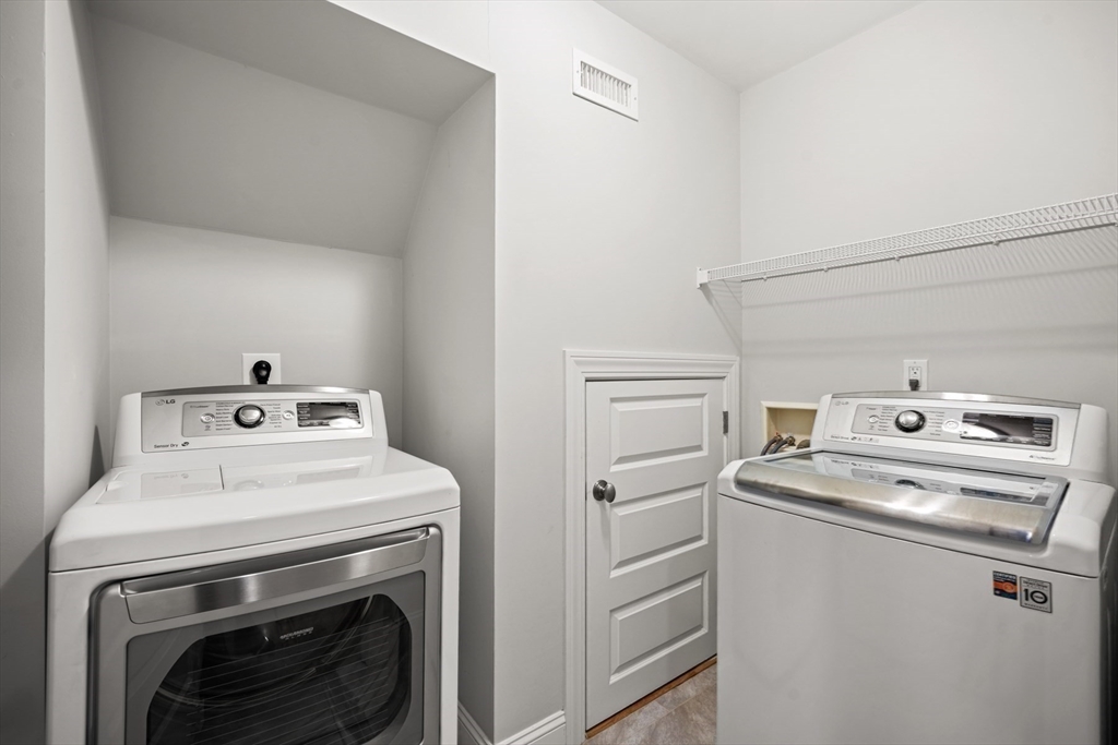 2 Thorndike Street, Unit 2 Brookline, MA 02446 - Photo 19 of 22 a utility room with dryer and washer