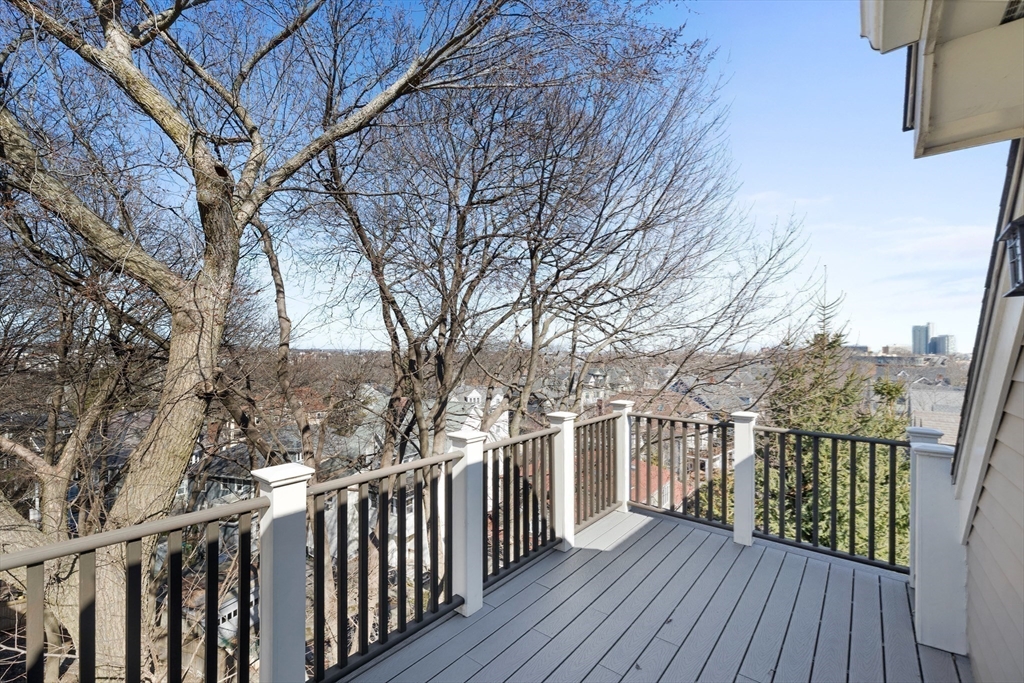 2 Thorndike Street, Unit 2 Brookline, MA 02446 - Photo 20 of 22 a view of a wooden roof deck