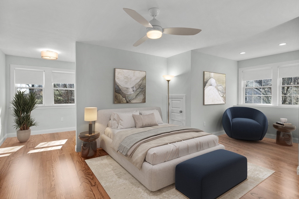 2 Thorndike Street, Unit 2 Brookline, MA 02446 - Photo 8 of 22 a bedroom with bed and a large window