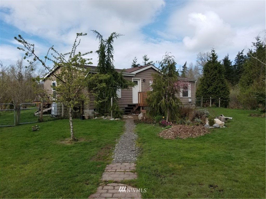 7939 Ham Road Custer, WA 98240 - Photo 1 of 1 a view of a house with a yard and sitting area