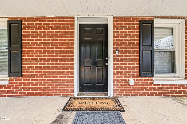 a front view of a house with a door