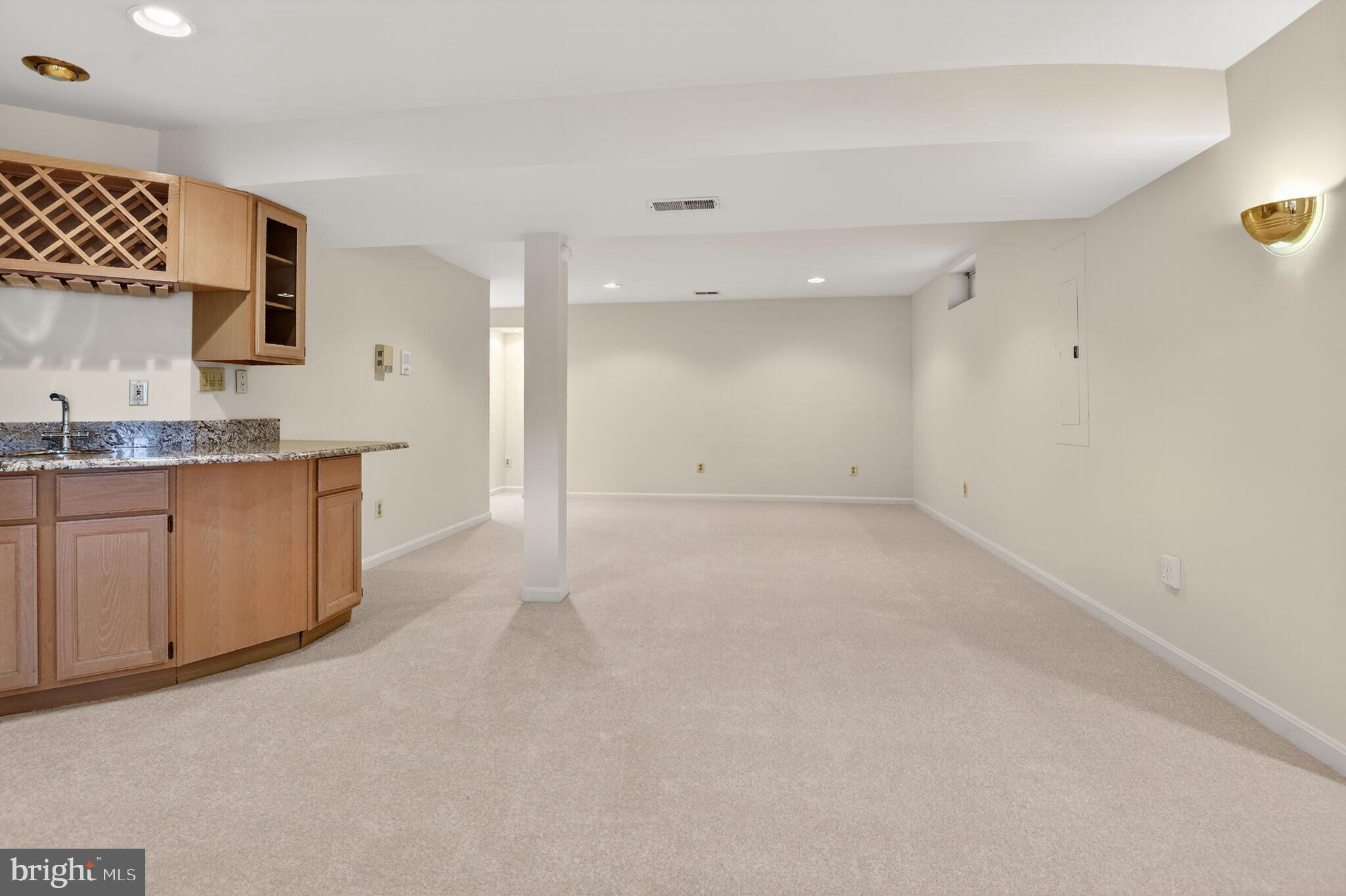 8301 Kings Ridge Court Springfield, VA 22153 - Photo 17 of 20 a view of a kitchen with a sink