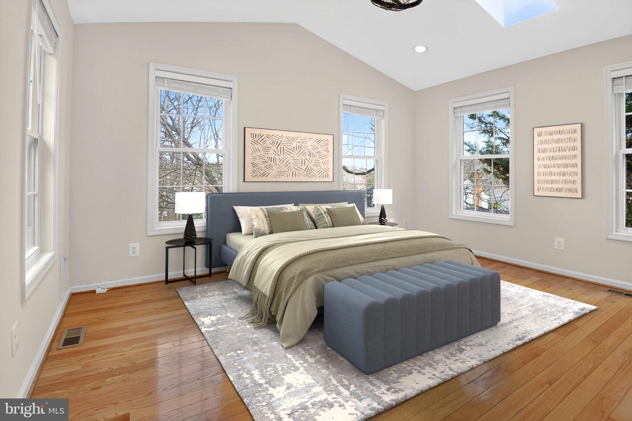 8301 Kings Ridge Court Springfield, VA 22153 - Photo 9 of 20 a bedroom with a bed and wooden floor