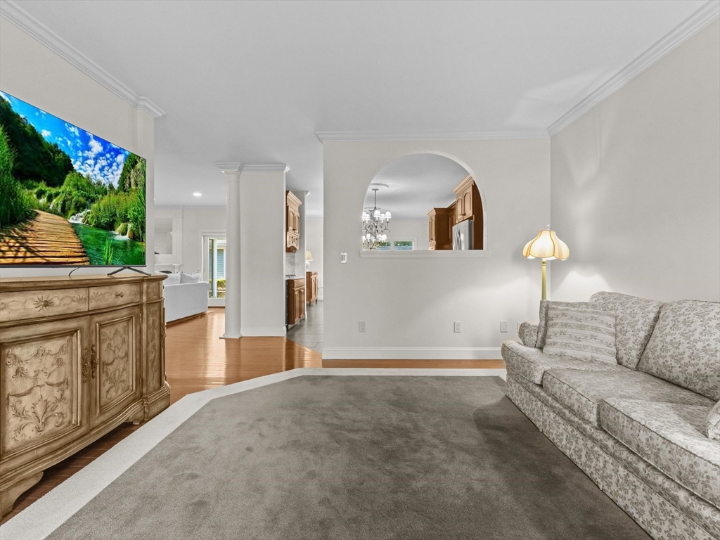 4 Quick Farm Road Westborough, MA 01581 - Photo 17 of 42 a living room with furniture and a fireplace