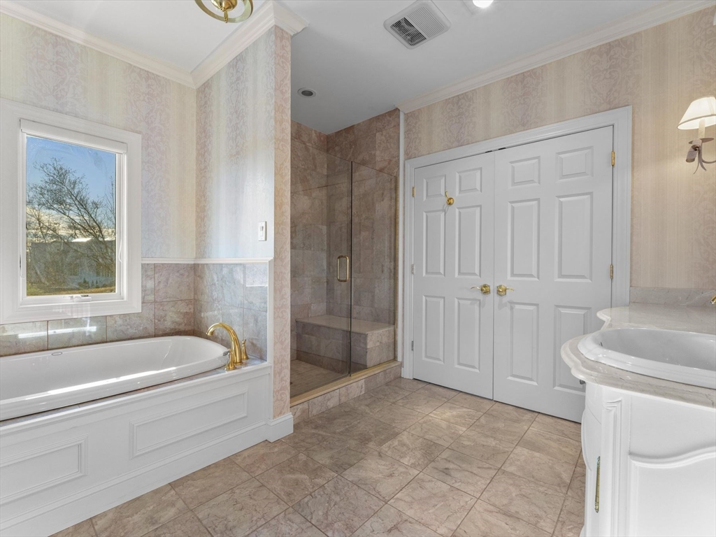 4 Quick Farm Road Westborough, MA 01581 - Photo 21 of 42 a bathroom with a tub a window and a shower