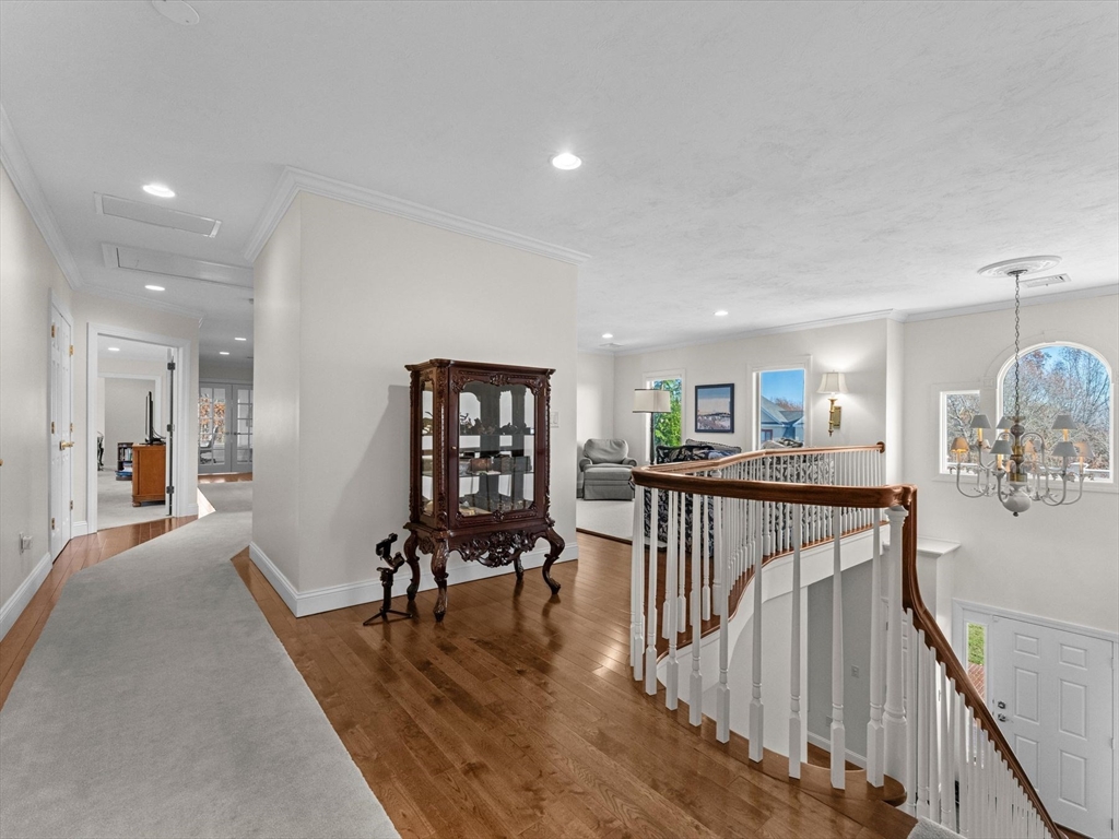 4 Quick Farm Road Westborough, MA 01581 - Photo 23 of 42 a view of a livingroom with furniture hardwood floor and a living room