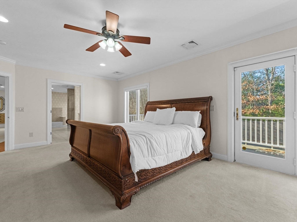 4 Quick Farm Road Westborough, MA 01581 - Photo 27 of 42 a spacious bedroom with a bed and a ceiling fan