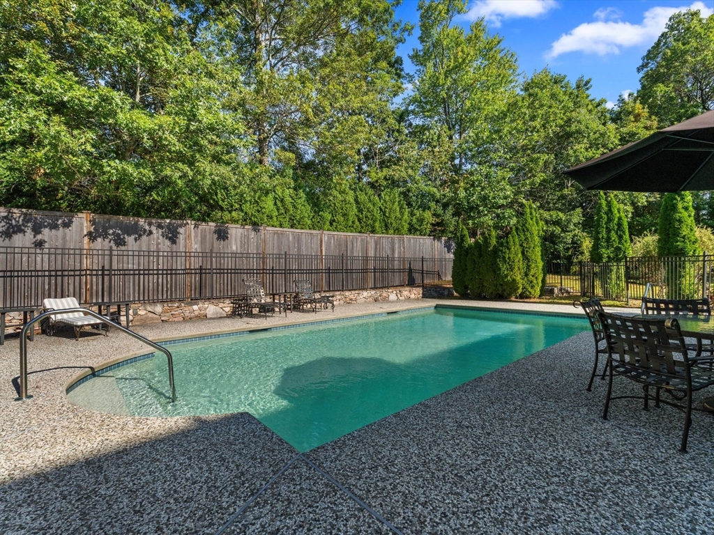 4 Quick Farm Road Westborough, MA 01581 - Photo 33 of 42 a view of a backyard with sitting area