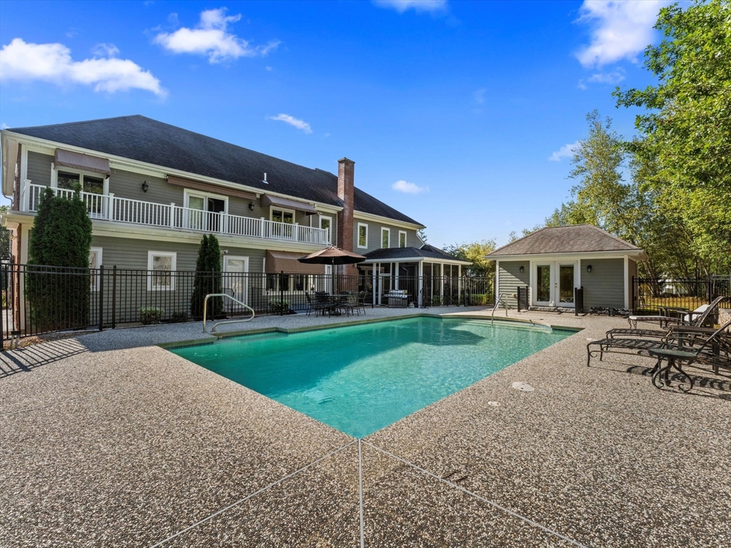 4 Quick Farm Road Westborough, MA 01581 - Photo 35 of 42 a front view of a house with a garden