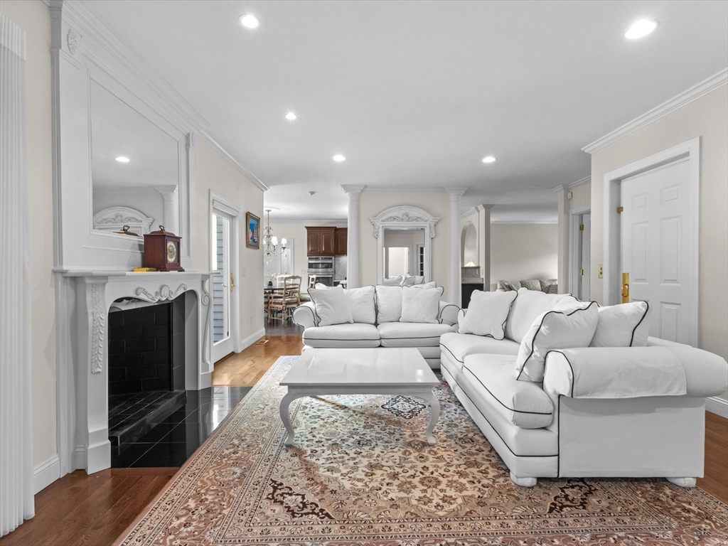 4 Quick Farm Road Westborough, MA 01581 - Photo 8 of 42 a living room with furniture and a fireplace