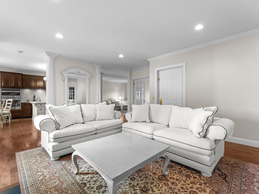 4 Quick Farm Road Westborough, MA 01581 - Photo 9 of 42 a living room with furniture and a view of kitchen
