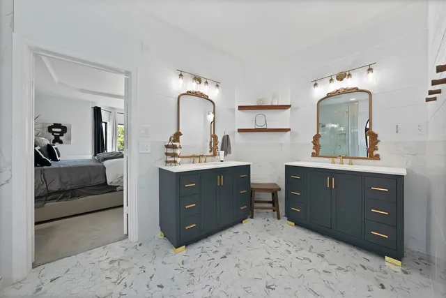 a spacious bathroom with a bathtub and a shower